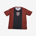 maroon jersey with black strip down middle