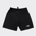 A pair of black athletic shorts with white trim and a logo on the left leg.