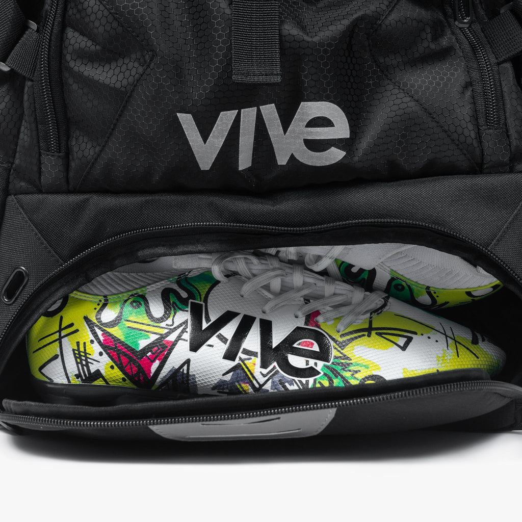 Ultimate Soccer Backpack - close up view with soccer cleat zipper compartment - Black with Silver lettering from Vive