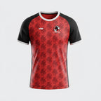 VIVE Create Future SHFC Home Match Jersey with red sleeves and a repeating headless horseman pattern on a red body. Made from moisture-wicking polyester.