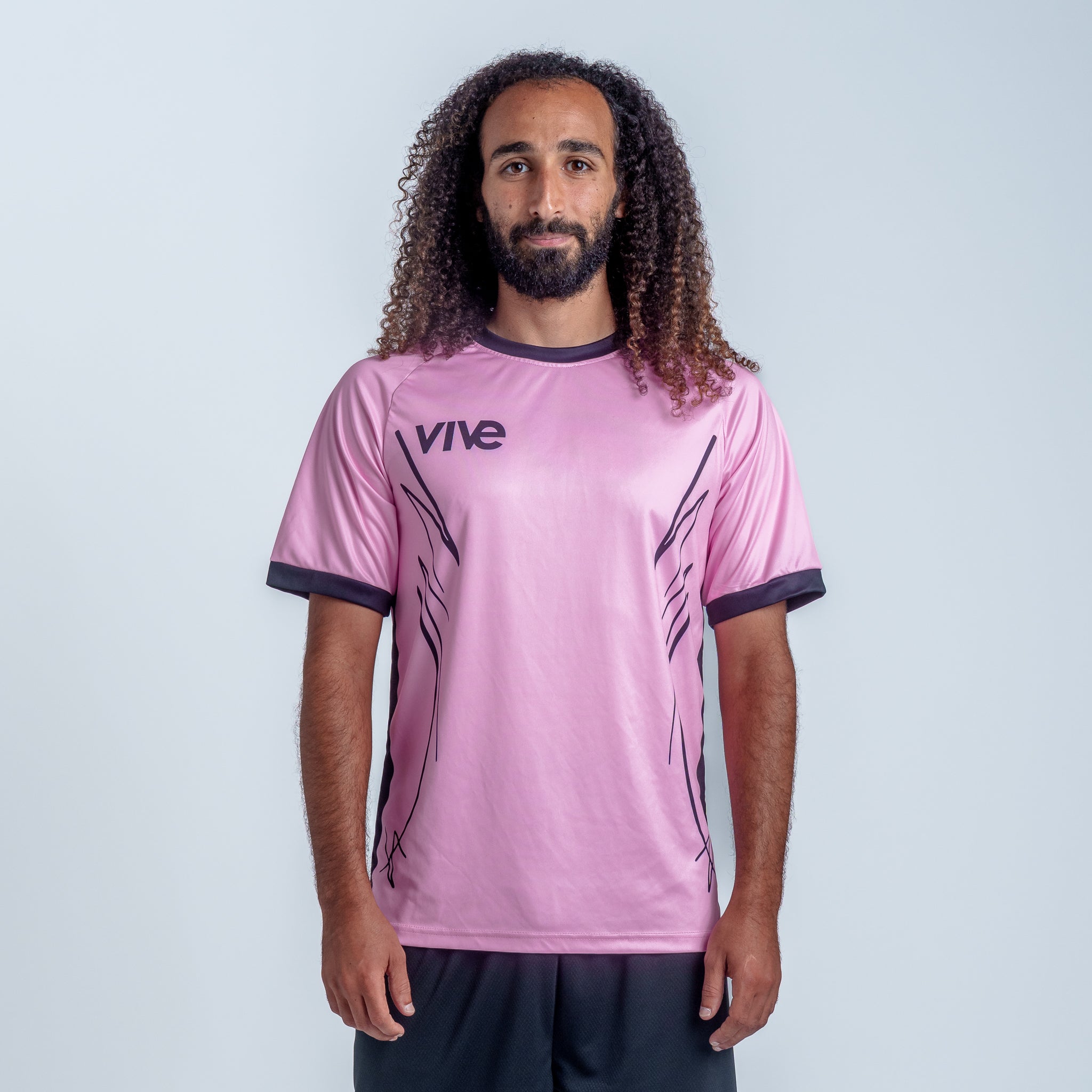 Espejo Soccer Training Jersey on Model - Pink color with Black design from Vive