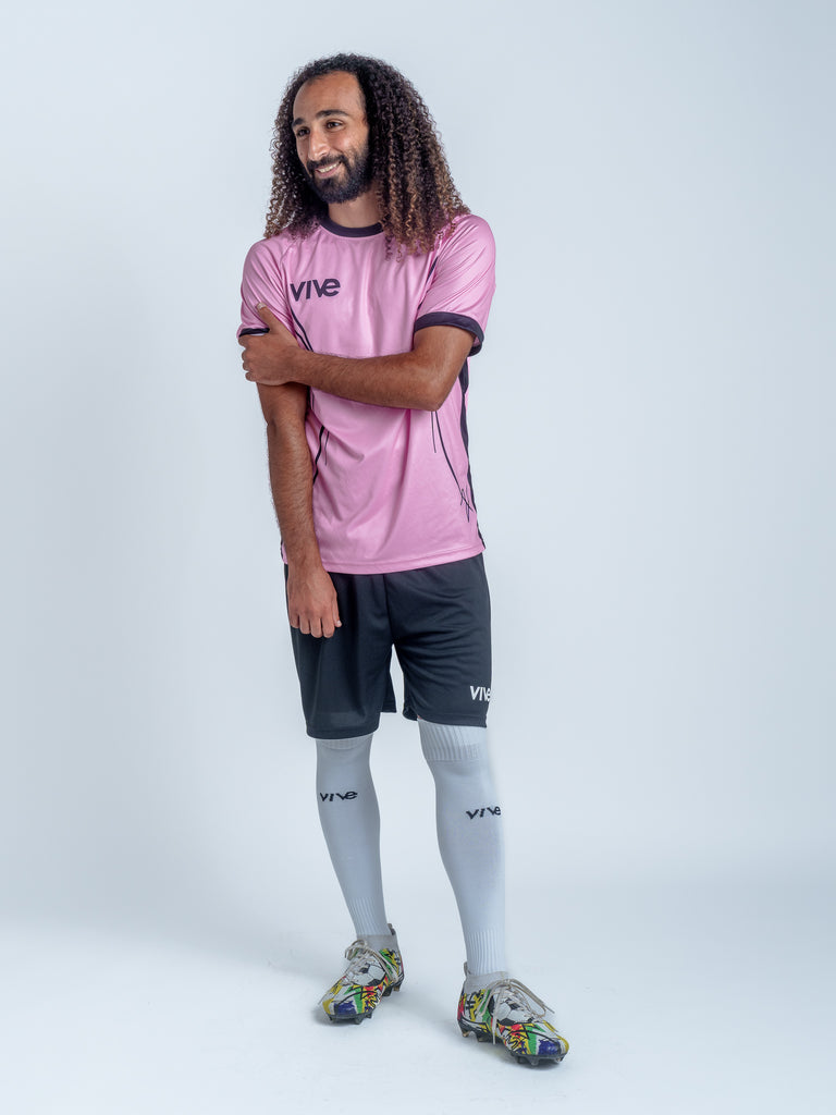 Espejo Soccer Training Jersey on Model Full Body - Pink color with Black design from Vive