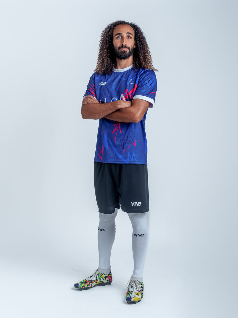 USA Wild Soccer Jersey on Model Fully Body - Blue and Red color with White lettering from VIVE