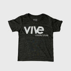 Black t-shirt with 'Vive create future' text on a brick wall background