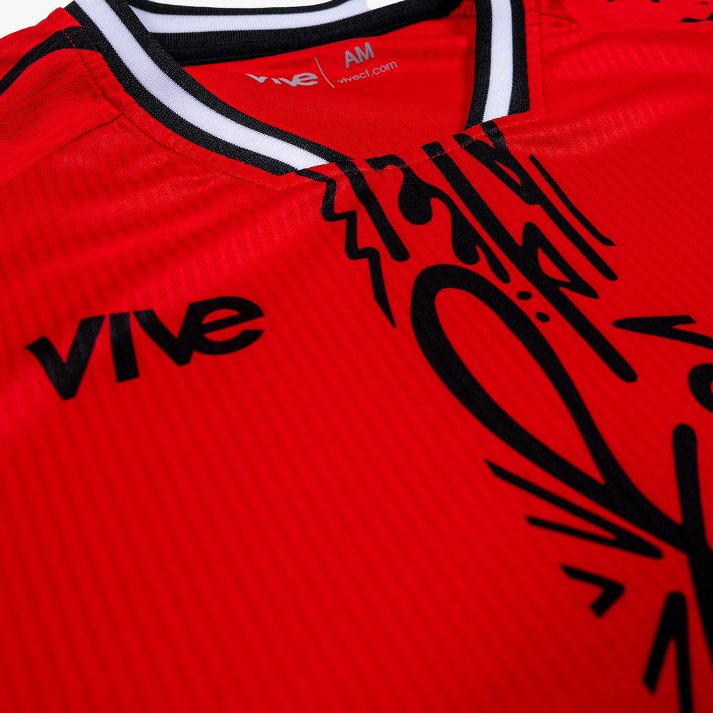 Arbol Soccer Training Jersey close up side view - Red color with Black design from VIVE