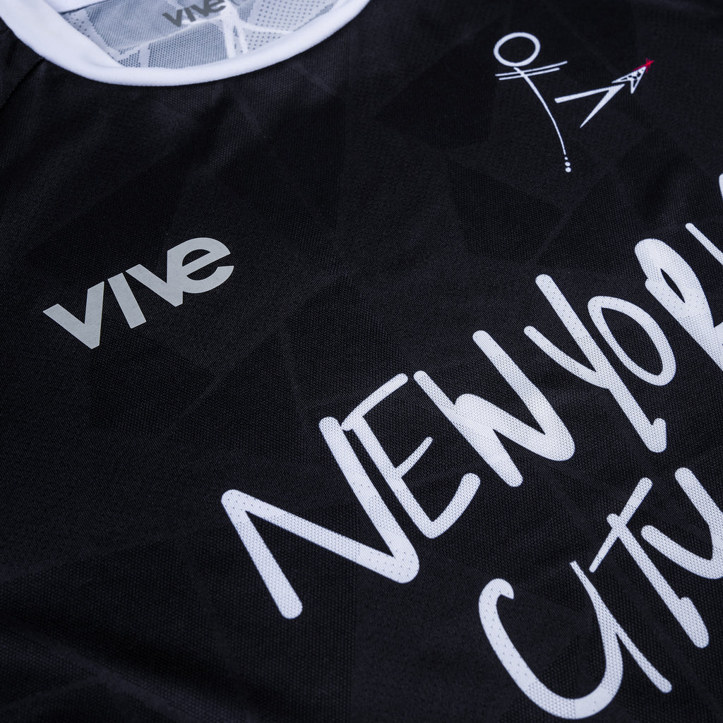 Ultimate Strike 22 NYC Soccer Jersey side view angle- Black color with white lettering from VIVE