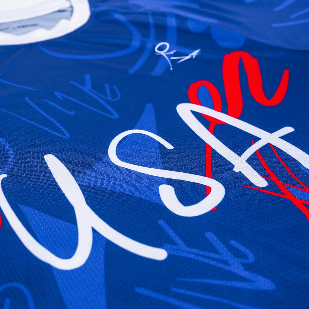USA Wild Soccer Jersey close up - Blue and Red color with White lettering from VIVE